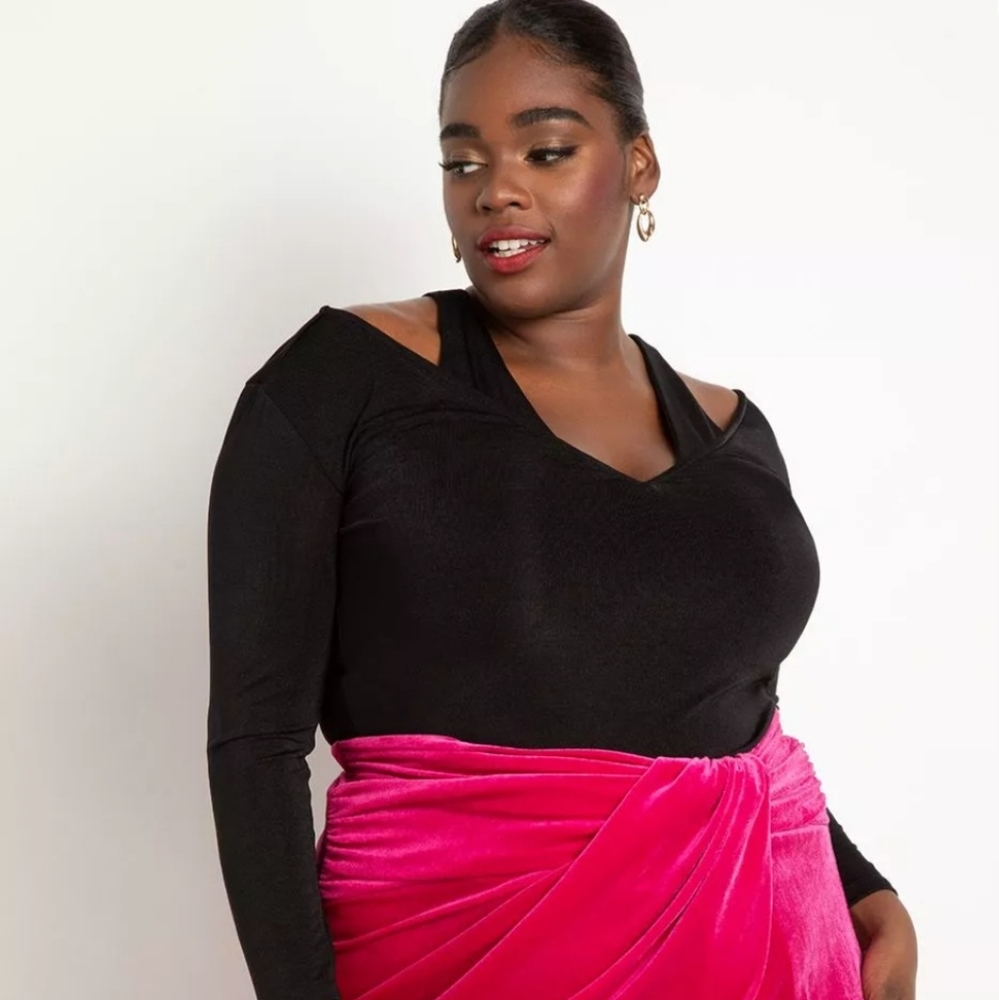 Brand New Top . Black and Stretchy , very stylish and elegant .